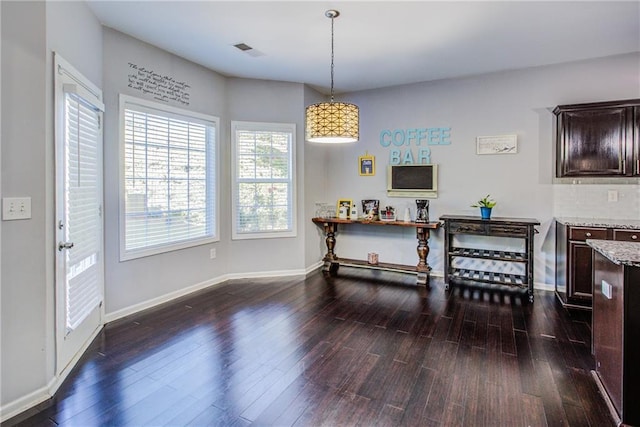 interior space with dark hardwood / wood-style flooring