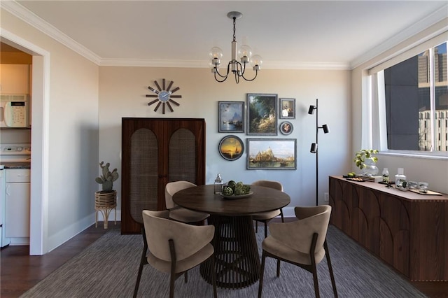 215 Piedmont Ave NE Unit 502, Atlanta, GA 30308 - dining room with a chandelier, crown molding, and dark wood finished floors
