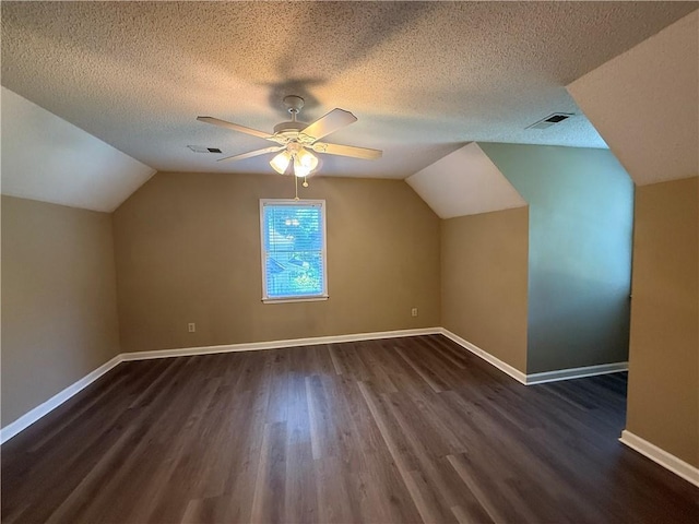 116 Cumberland Way, Dallas, GA 30132 - bonus room with dark wood-style flooring, vaulted ceiling, a ceiling fan, and a textured ceiling