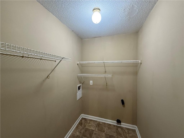 116 Cumberland Way, Dallas, GA 30132 - washroom with hookup for a washing machine and a textured ceiling