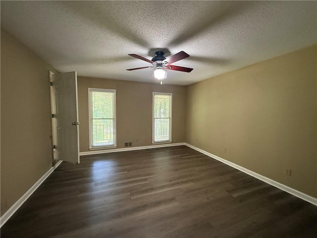 116 Cumberland Way, Dallas, GA 30132 - unfurnished room with dark wood-type flooring, a ceiling fan, and a textured ceiling