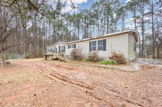 view of front of home featuring crawl space