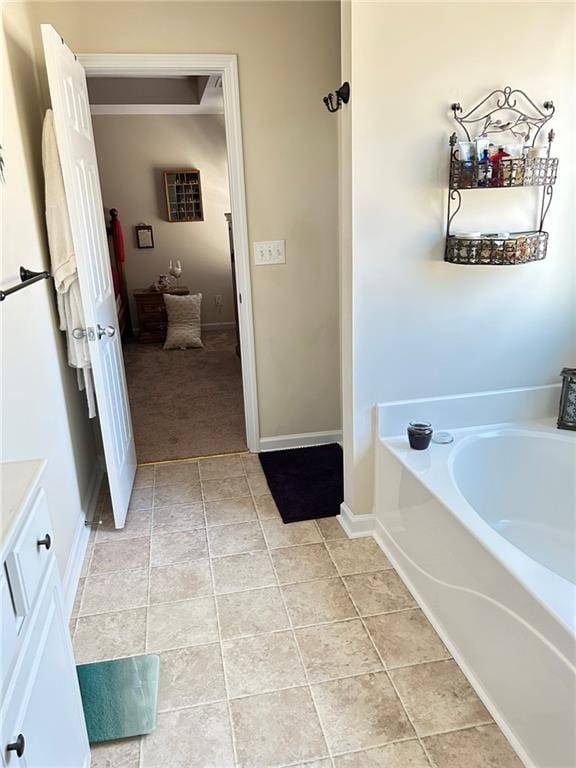 bathroom featuring vanity and a bathing tub