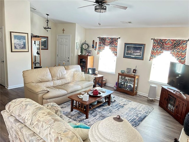 living room with hardwood / wood-style flooring and ceiling fan