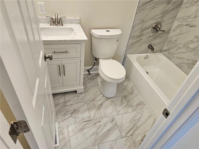 full bathroom featuring vanity, toilet, and tiled shower / bath combo