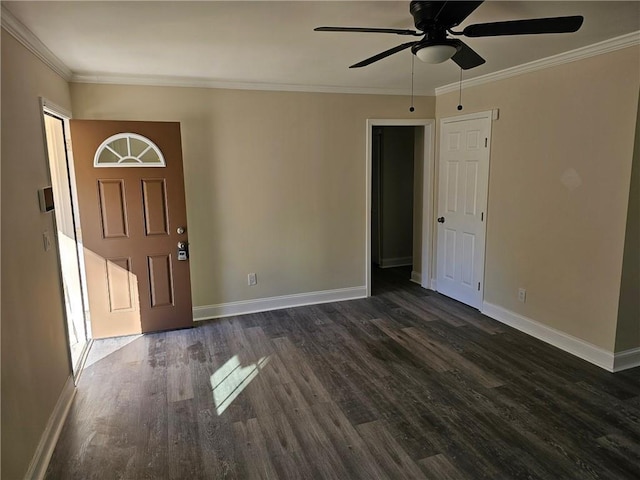 foyer featuring ceiling fan, dark hardwood / wood-style floors, and ornamental molding