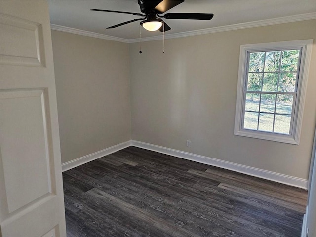 spare room with dark wood-type flooring, ceiling fan, and crown molding