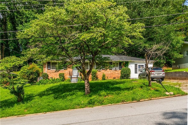 379 Utoy Cir SW, Atlanta, GA 30331 - ranch-style house featuring a front lawn and brick siding