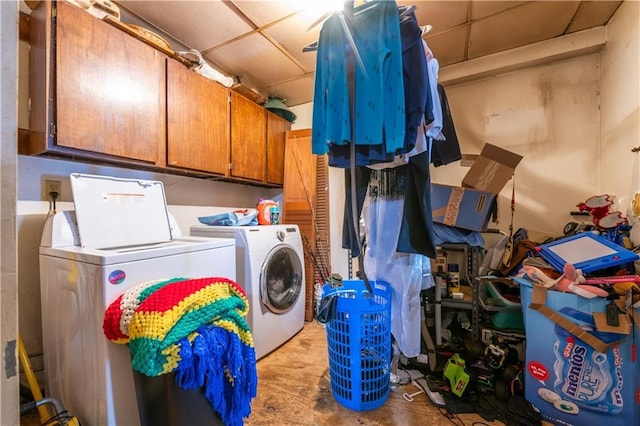 379 Utoy Cir SW, Atlanta, GA 30331 - laundry room with washing machine and clothes dryer and cabinet space