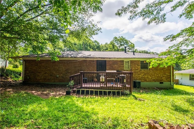 379 Utoy Cir SW, Atlanta, GA 30331 - rear view of property with brick siding, crawl space, a deck, and a yard