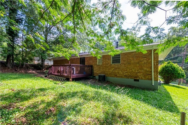 379 Utoy Cir SW, Atlanta, GA 30331 - back of house featuring a lawn, brick siding, a deck, and crawl space