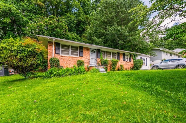 379 Utoy Cir SW, Atlanta, GA 30331 - single story home featuring brick siding and a front yard
