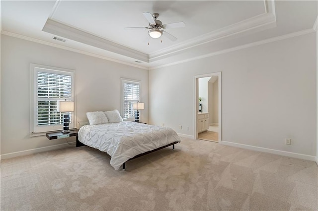 bedroom with light carpet, crown molding, a raised ceiling, and baseboards