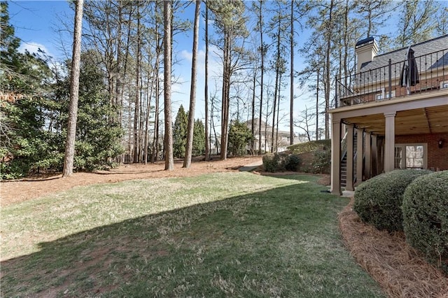 view of yard featuring stairway