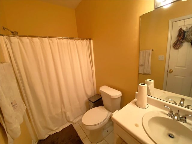 bathroom with sink, toilet, a shower with curtain, and tile patterned flooring