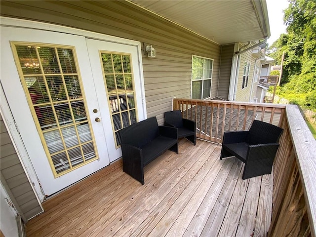 deck with an outdoor hangout area