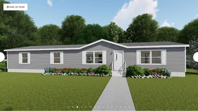 564 Ridge Rd, Dawsonville, GA 30534 - manufactured / mobile home featuring a front lawn