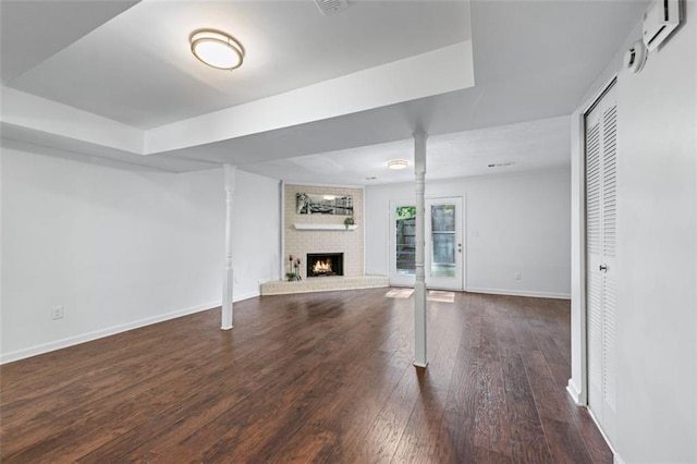 706 Twin Brooks Ct SE, Marietta, GA 30067 - unfurnished living room with wood-type flooring, baseboards, and a fireplace
