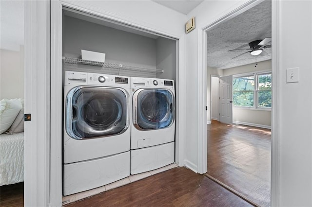706 Twin Brooks Ct SE, Marietta, GA 30067 - clothes washing area with laundry area, a ceiling fan, washer and dryer, baseboards, and dark wood-style floors