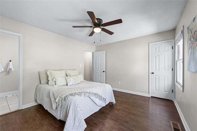 706 Twin Brooks Ct SE, Marietta, GA 30067 - bedroom featuring visible vents, baseboards, ceiling fan, and wood finished floors