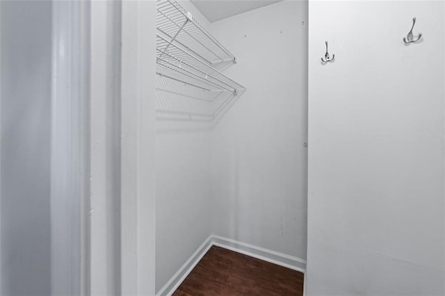 706 Twin Brooks Ct SE, Marietta, GA 30067 - walk in closet featuring dark wood finished floors