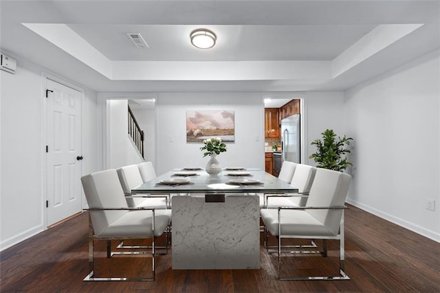 706 Twin Brooks Ct SE, Marietta, GA 30067 - dining room with a tray ceiling, baseboards, visible vents, and stairway