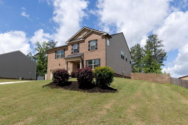 view of front of house featuring brick siding and an attached garage