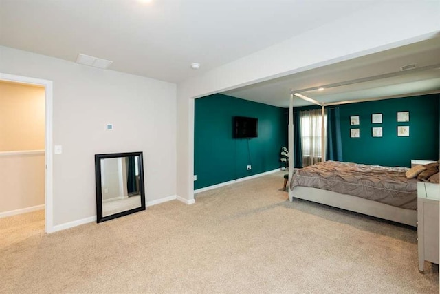 bedroom with carpet flooring and baseboards