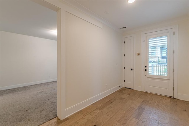 foyer featuring wood-type flooring