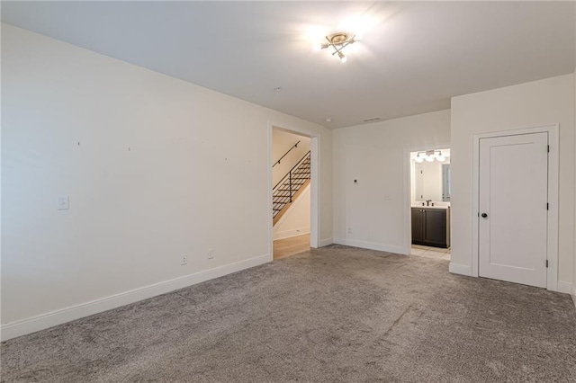 view of carpeted spare room