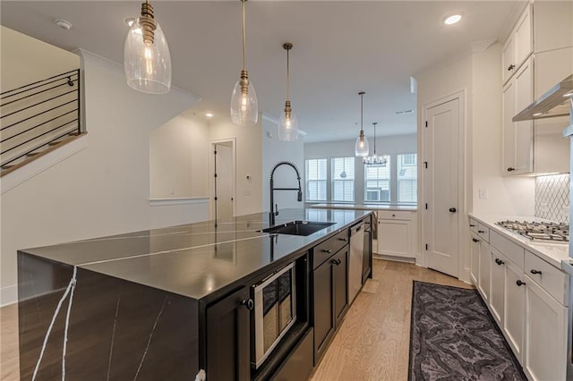 unfurnished dining area with dark hardwood / wood-style flooring, ornamental molding, and plenty of natural light