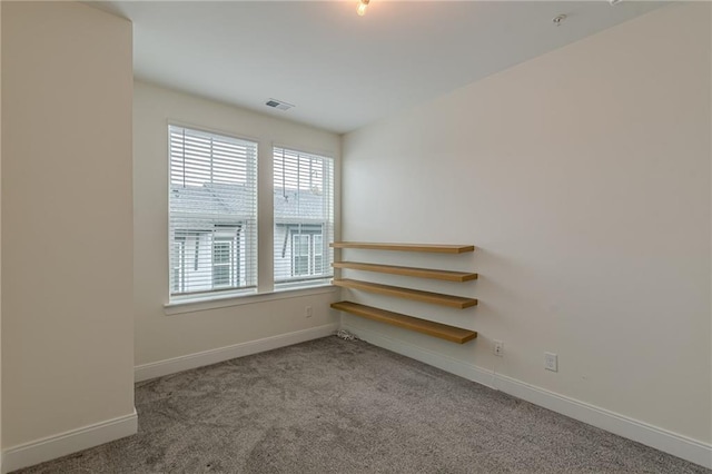 unfurnished bedroom featuring a closet and carpet floors