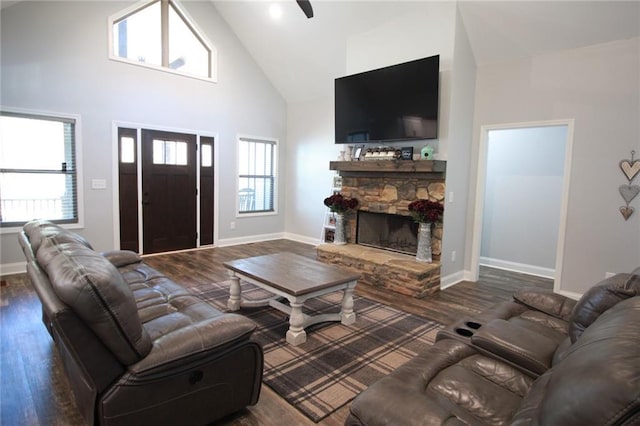 223 Deans Dr, Dawsonville, GA 30534 - living room with baseboards, high vaulted ceiling, wood finished floors, and a fireplace