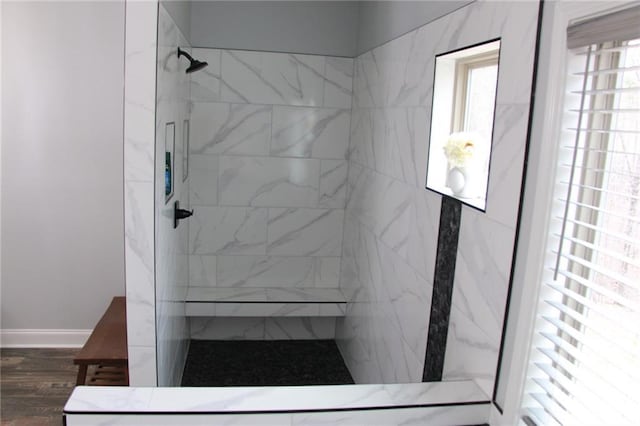 223 Deans Dr, Dawsonville, GA 30534 - bathroom featuring baseboards, tiled shower, and wood finished floors