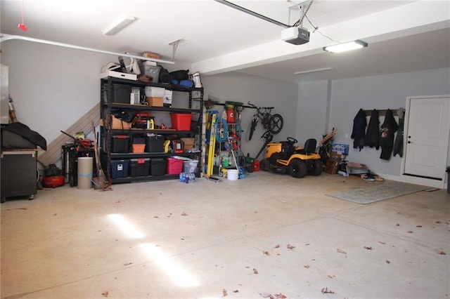 223 Deans Dr, Dawsonville, GA 30534 - garage featuring a garage door opener