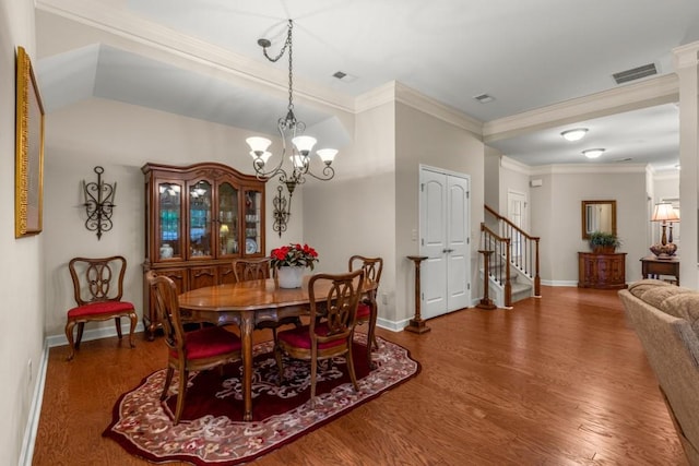 325 Rdg Hill Cir Unit 3, Marietta, GA 30064 - dining area with a chandelier, wood finished floors, ornamental molding, stairs, and baseboards