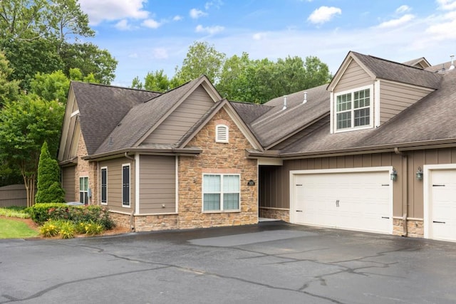 325 Rdg Hill Cir Unit 3, Marietta, GA 30064 - view of front facade with stone siding, driveway, and a shingled roof