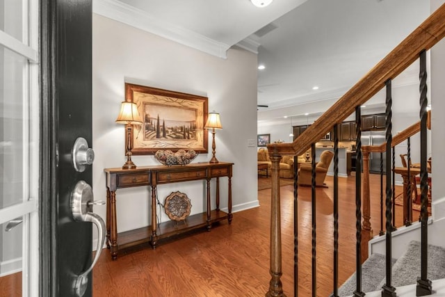 325 Rdg Hill Cir Unit 3, Marietta, GA 30064 - entrance foyer featuring ornamental molding, stairs, wood finished floors, baseboards, and recessed lighting
