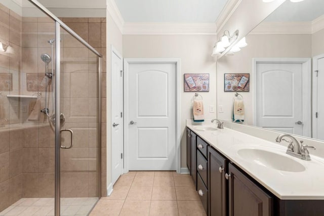 325 Rdg Hill Cir Unit 3, Marietta, GA 30064 - bathroom featuring double vanity, ornamental molding, a stall shower, and tile patterned floors