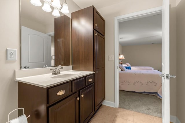 325 Rdg Hill Cir Unit 3, Marietta, GA 30064 - ensuite bathroom featuring vanity, tile patterned flooring, and baseboards