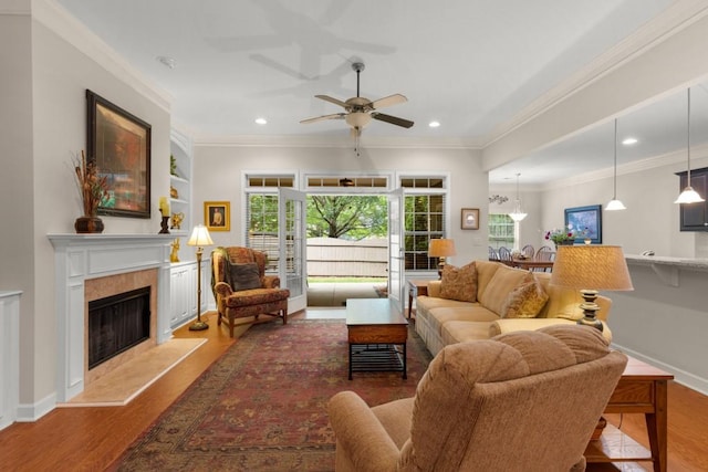 325 Rdg Hill Cir Unit 3, Marietta, GA 30064 - living room featuring ornamental molding, wood finished floors, ceiling fan, a fireplace, and recessed lighting