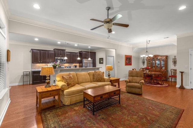 325 Rdg Hill Cir Unit 3, Marietta, GA 30064 - living area featuring ceiling fan, wood finished floors, recessed lighting, a chandelier, and crown molding