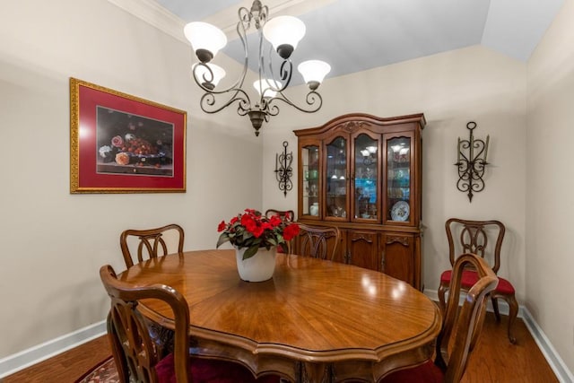 325 Rdg Hill Cir Unit 3, Marietta, GA 30064 - dining room with a chandelier, baseboards, wood finished floors, and vaulted ceiling