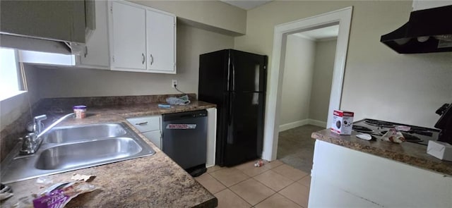 1516 Carter Rd, Decatur, GA 30032 - kitchen with freestanding refrigerator, dishwashing machine, white cabinetry, under cabinet range hood, and a sink
