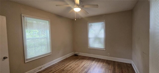 1516 Carter Rd, Decatur, GA 30032 - spare room with baseboards, a ceiling fan, and wood finished floors