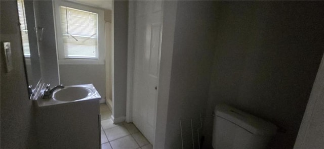 1516 Carter Rd, Decatur, GA 30032 - bathroom with a sink, tile patterned flooring, and toilet