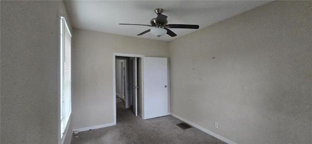 1516 Carter Rd, Decatur, GA 30032 - unfurnished bedroom featuring carpet flooring, a ceiling fan, baseboards, and multiple windows