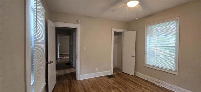 1516 Carter Rd, Decatur, GA 30032 - unfurnished bedroom featuring a closet, visible vents, dark wood-style flooring, baseboards, and a ceiling fan