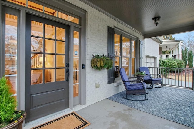 doorway to property with a porch