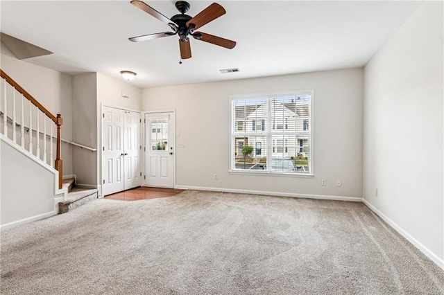 1049 Prestwyck Ct, Alpharetta, GA 30004 - entryway featuring carpet floors, stairs, and ceiling fan